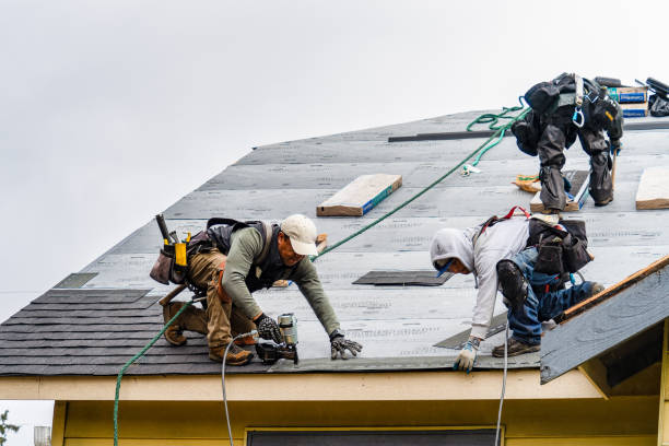 Professional Gutter Installation technician working in Cheshire, MA